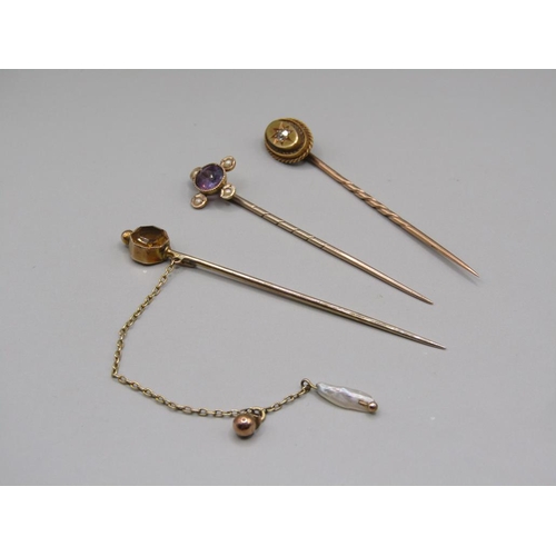 1545 - THREE GOLD STONE SET PINS