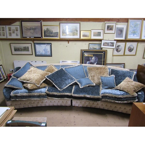 1942 - UPHOLSTERED FOUR SEATER CONTEMPORARY SOFA WITH SHAPED BACK AND CUSHIONS