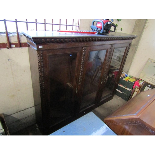 558 - VICTORIAN CARVED OAK BOOKCASE