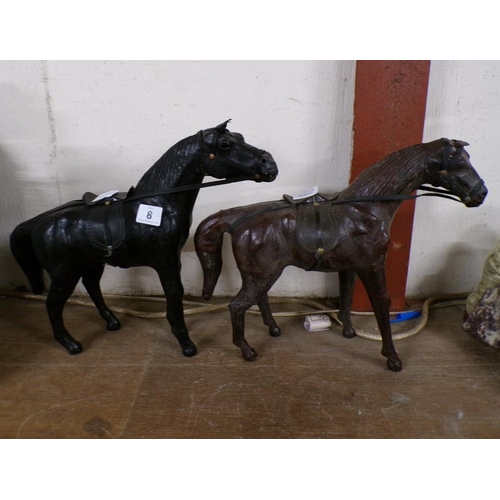 8 - TWO LEATHER HORSES