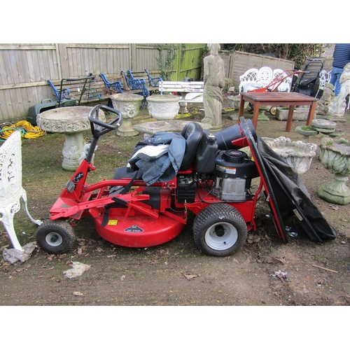 1049 - BRIGGS AND STRATTON MOWER AND ACCESSORIES