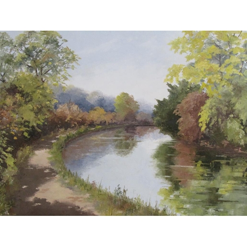 1229 - OLIVE WALKER - A BEND IN THE CANAL, SIGNED IN MONO, FRAMED, OIL ON CANVAS, 60CM X 90CM