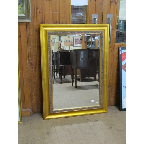 1252 - GILT FRAMED WALL MIRROR, 116CM X 85CM