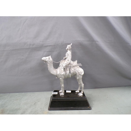 1498 - WHITE METAL INDIAN FIGURE OF A CAMEL WITH RIDER ON PLINTH - FIGURE 30cms H