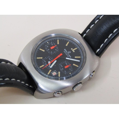 1531 - 1970'S BRIETLING GENEVE LONG PLANE CHRONOGRAPH WITH BLACK DIAL AND ORANGE HANDS, STAMPED 7103 TO CAS... 