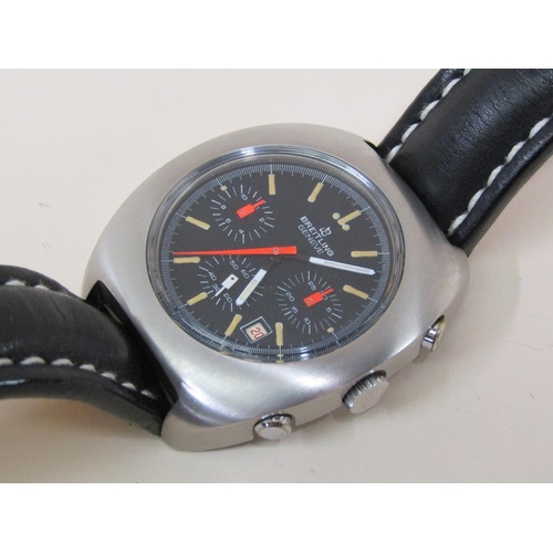 1531 - 1970'S BRIETLING GENEVE LONG PLANE CHRONOGRAPH WITH BLACK DIAL AND ORANGE HANDS, STAMPED 7103 TO CAS... 