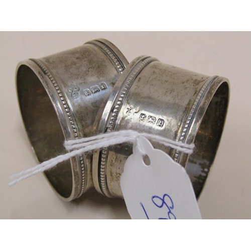 1536 - PAIR OF SILVER NAPKIN RINGS