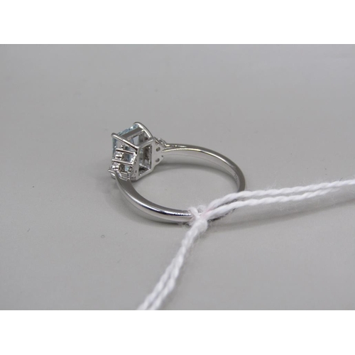 1633 - 18ct AQUAMARINE AND DIAMOND RING SIZE N