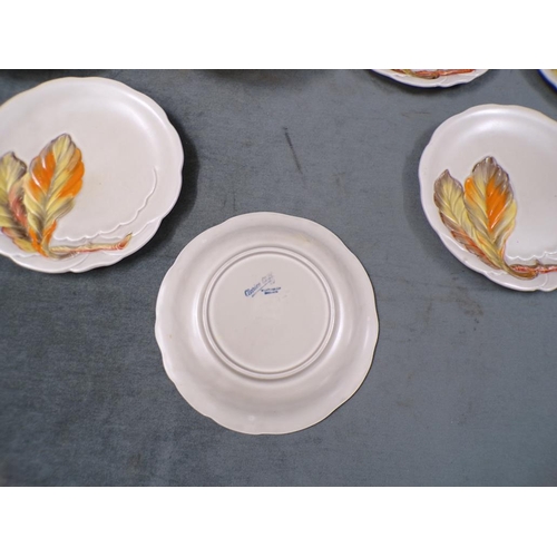 1883 - CLARICE CLIFF MOULDED DINNERWARES WITH LEAF DESIGN - PLATES 23cms DIA