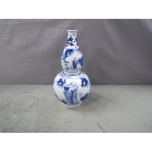 1900 - ORIENTAL BLUE AND WHITE DOUBLE GOURD VASE, 30cms H