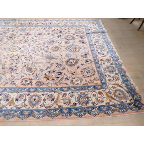 1944 - WOOLLEN CARPET OF FAWN BROWN AND BLUE FLORAL PATTERN 375 x 293 cms