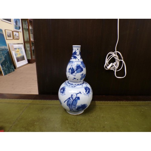 1900 - ORIENTAL BLUE AND WHITE DOUBLE GOURD VASE, 30cms H