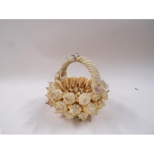 1328 - SHELL FORMED BASKET, 25CM H