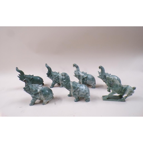 1329 - COLLECTION OF CARVED SOAPSTONE ELEPHANTS - LARGEST 18CM H