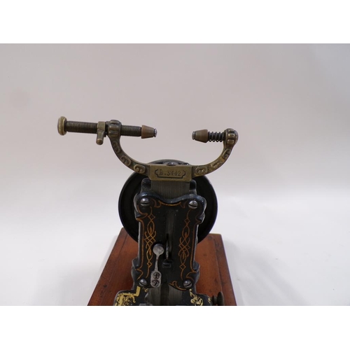 1348 - ANTIQUE SEWING MACHINE - JAMES G WEIRS, LONDON, CASE 27CM H