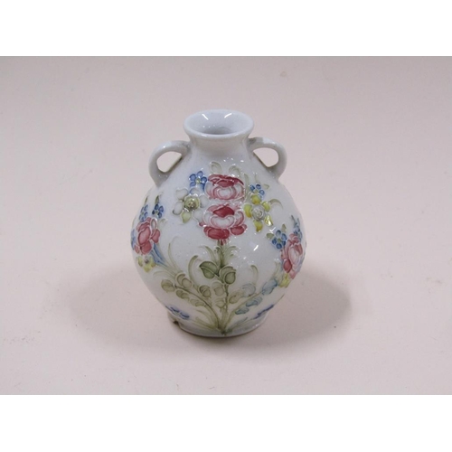 1470 - McINTYRE MOORCROFT MINIATURE TWO HANDLED URN (CHIP TO BASE)