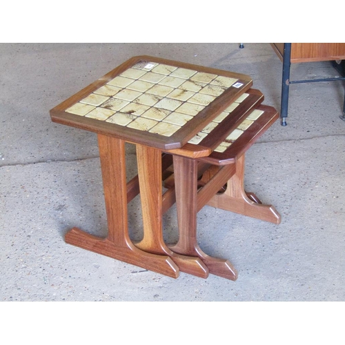 703 - NEST OF TILE TOP TABLES