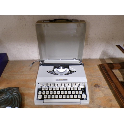 70 - PORTABLE TYPEWRITER