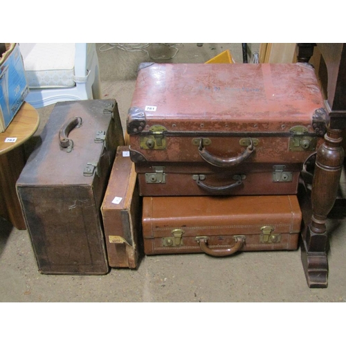 761 - FIVE VINTAGE SUITCASES