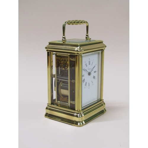 16 - A late 20c French carriage clock in glazed brass 'Gorge' case, the white rectangular dial having Rom... 