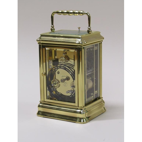 16 - A late 20c French carriage clock in glazed brass 'Gorge' case, the white rectangular dial having Rom... 