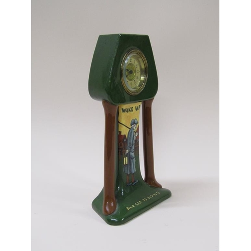 17 - An early 20c mantel clock in an 'Intarsio' Art Nouveau inspired pottery case.  The green glazed case... 