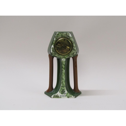 17 - An early 20c mantel clock in an 'Intarsio' Art Nouveau inspired pottery case.  The green glazed case... 