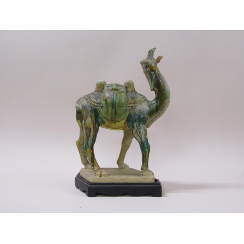 171 - A decorative Chinese Tang style camel, three colour (Sancai) with a custom made stand, 38cm h.