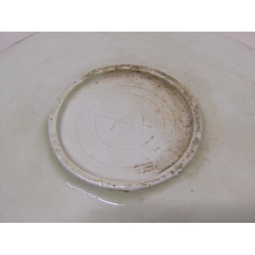 172 - A Chinese Ding type ware cream glazed dish, engraved with fish decoration, 18cm diam.