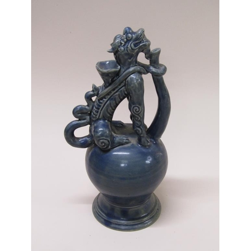 173 - A water jar with dragon handle and spout, blue glazed, possibly Vietnamese 17c, a/f chip to base rim... 