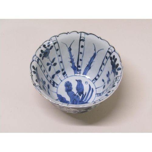 175 - Three Chinese Kraak style blue on white decorated bowls, 13cm diam.