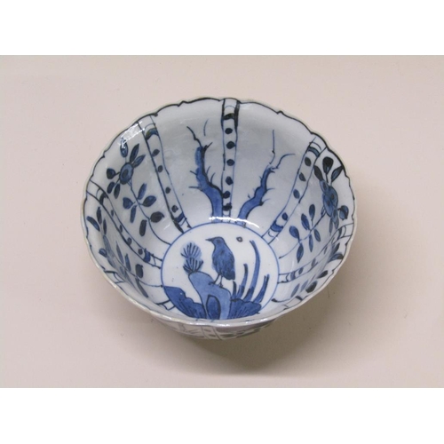 175 - Three Chinese Kraak style blue on white decorated bowls, 13cm diam.