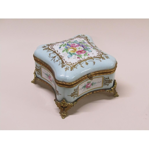 191 - A French Limoges porcelain casket box, hand painted with flowers and gilded with gilt metal mounts, ... 