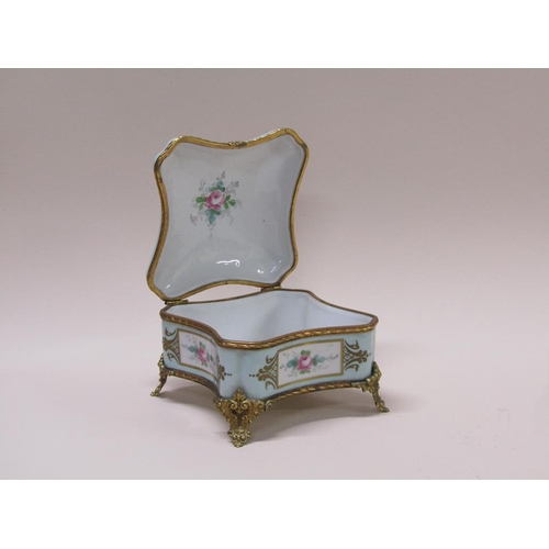 191 - A French Limoges porcelain casket box, hand painted with flowers and gilded with gilt metal mounts, ... 