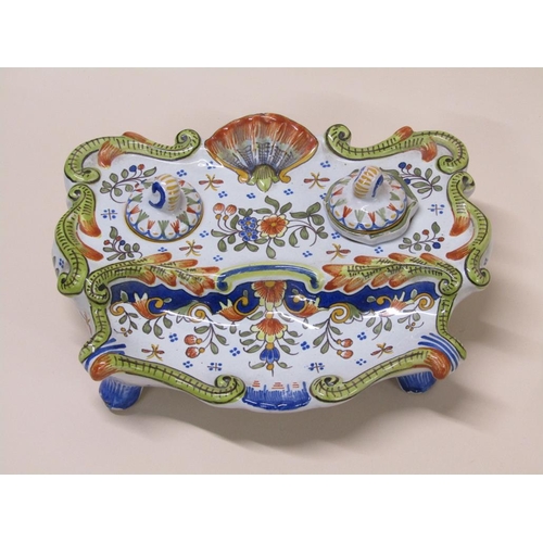 193 - A French faience inkstand with floral decoration and shell motif, 20cm w- one well missing.