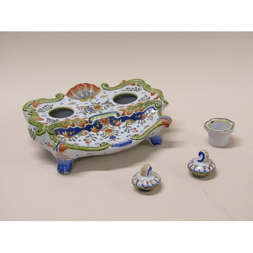 193 - A French faience inkstand with floral decoration and shell motif, 20cm w- one well missing.