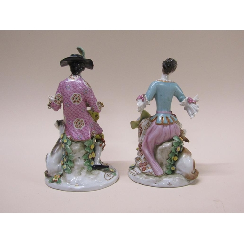 194 - A pair of late 19c/early 20c Samson porcelain figures, shepherdess and gentleman with dog, in period... 