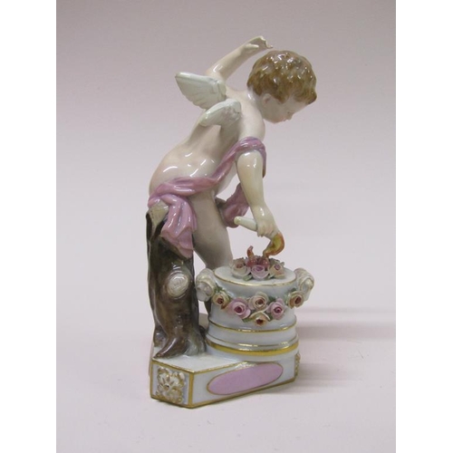 195 - A 19c Meissen porcelain figure of a cupid forging hearts, raised on a rectangular base, titled 'Je l... 