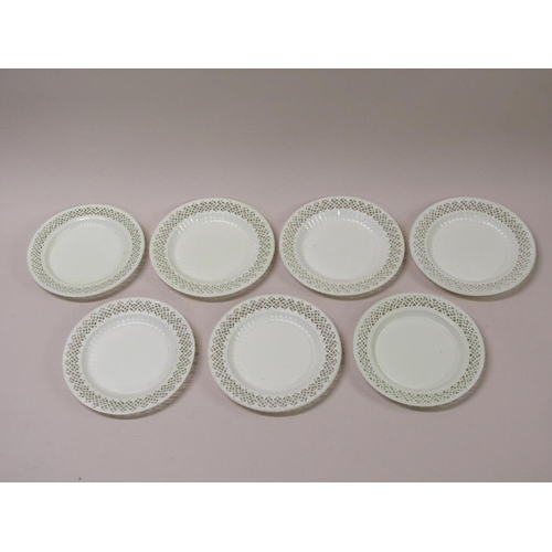 199 - A set of seven late 18c/early 19c Leeds creamware plates, each with a pierced flower head border wit... 