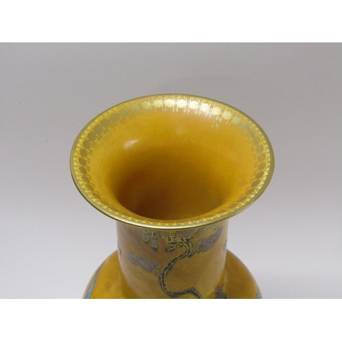 207 - An early 20c Carltonware vase, decorated on a matt orange, yellow ground, Chinese bird and cloud pat... 