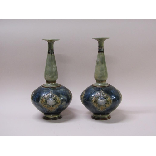 211 - A pair of Doulton Lambeth Art Nouveau stoneware vases with foliate panels, the of ovoid form with ba... 