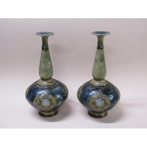 211 - A pair of Doulton Lambeth Art Nouveau stoneware vases with foliate panels, the of ovoid form with ba... 