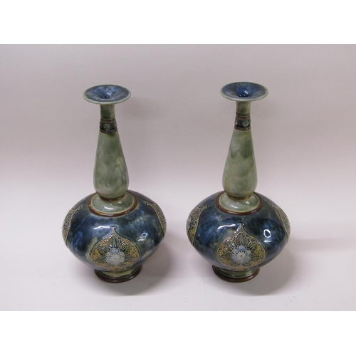 211 - A pair of Doulton Lambeth Art Nouveau stoneware vases with foliate panels, the of ovoid form with ba... 