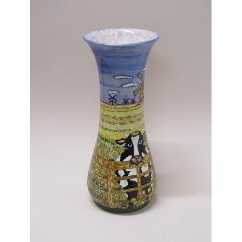 220 - An Unusual Moorcroft vase of cylindrical baluster form, tube line decorated with a cow head over fen... 