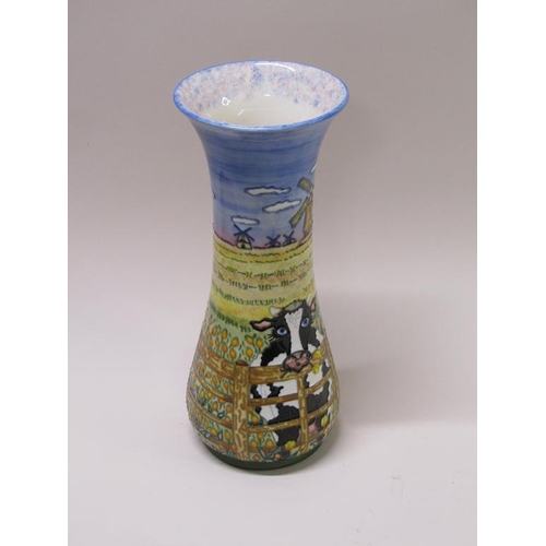 220 - An Unusual Moorcroft vase of cylindrical baluster form, tube line decorated with a cow head over fen... 