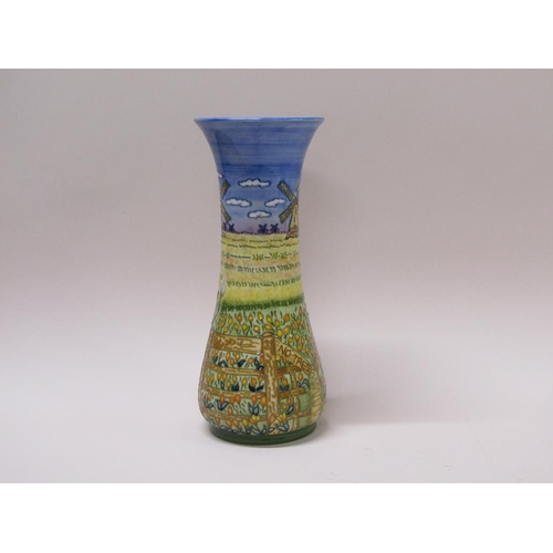 220 - An Unusual Moorcroft vase of cylindrical baluster form, tube line decorated with a cow head over fen... 