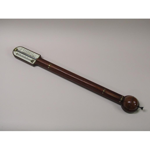 36 - A mid 19c mahogany cistern barometer signed Thos. Jones & Sons, 62 Charing Cross.  The round top cas... 