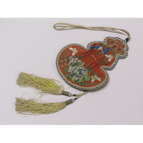 69 - A Japanese Meiji period silk purse with embroidered decoration and carrying strap and tassels, 18cm ... 