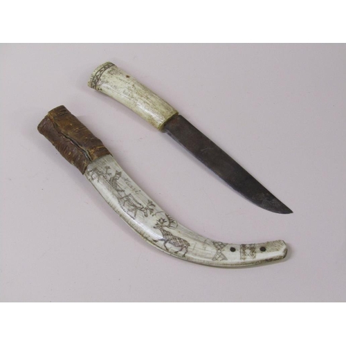 12 - A late 19c/early 20c  dagger with bone handle and sheath, the sheath engraved with reindeers and a s... 