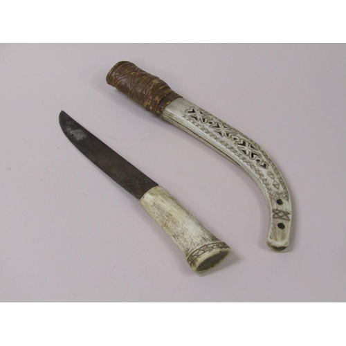 12 - A late 19c/early 20c  dagger with bone handle and sheath, the sheath engraved with reindeers and a s... 